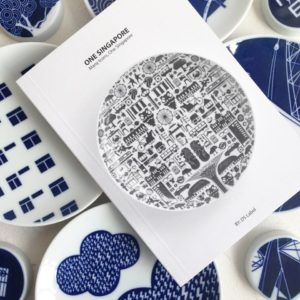 Accompanying DS Label’s newest porcelain plate, “One Singapore,” is this booklet consisting of archival images from the National Archives of Singapore. The book is not for sale because of copyright restrictions but can be obtained when customers order the plate. | S U P E R M A M A