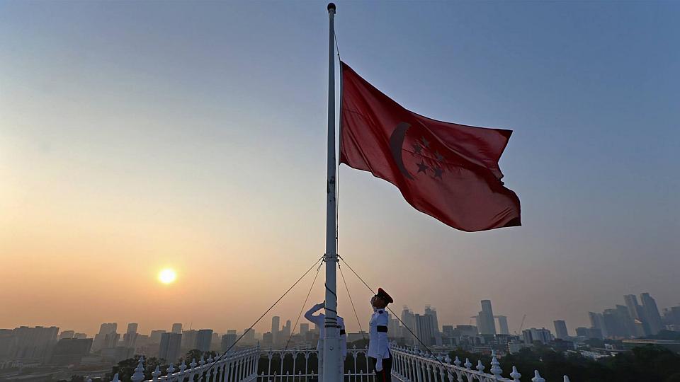 A flag at half-mast at the Istana on March 23, 2015. BY MINISTRY OF COMMUNICATIONS AND INFORMATION / TERENCE TAN